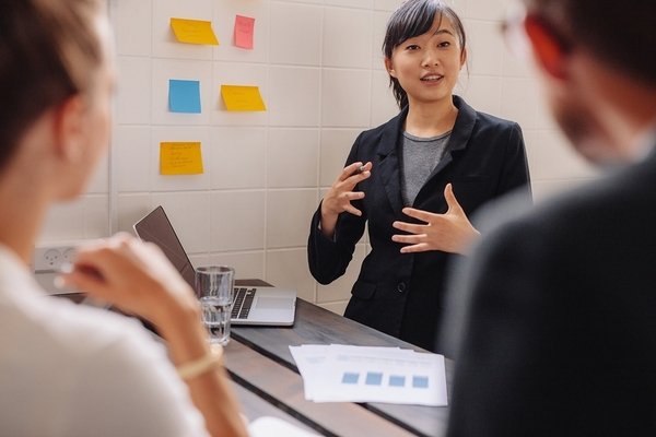Instructor helping students.