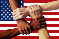 Holding hands and american flag Equitable Delivery of Services